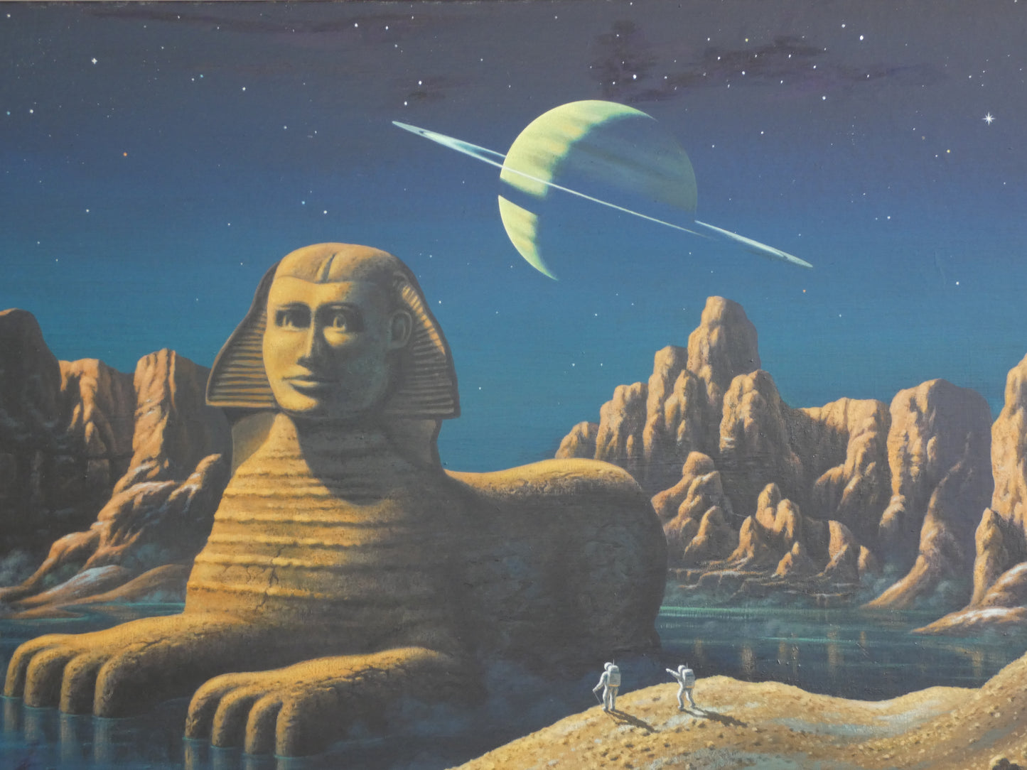 “Sci-Fi Sphinx by David A. Hardy – Vintage 1970s Space Art Print (100 × 58.8 cm) | Surreal Ringed Planet Landscape”