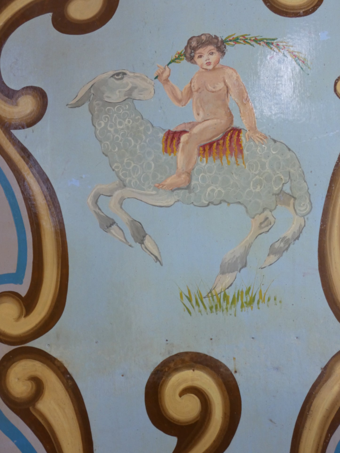 Antique Hand Painted wooden carousel fairground panel with cherub and sheep.