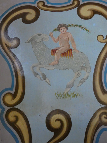 Antique Hand Painted wooden carousel fairground panel with cherub and sheep.