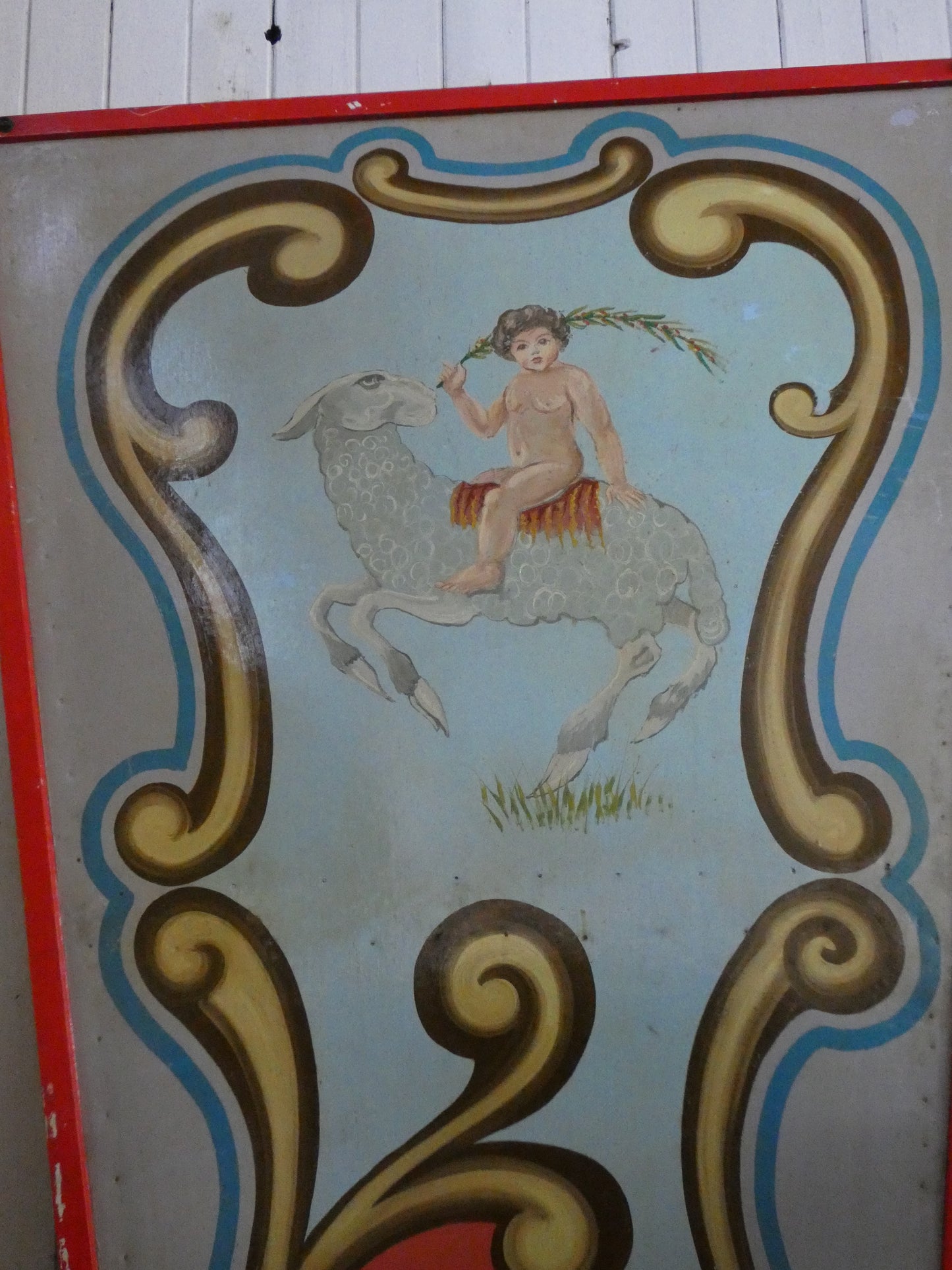 Antique Hand Painted wooden carousel fairground panel with cherub and sheep.
