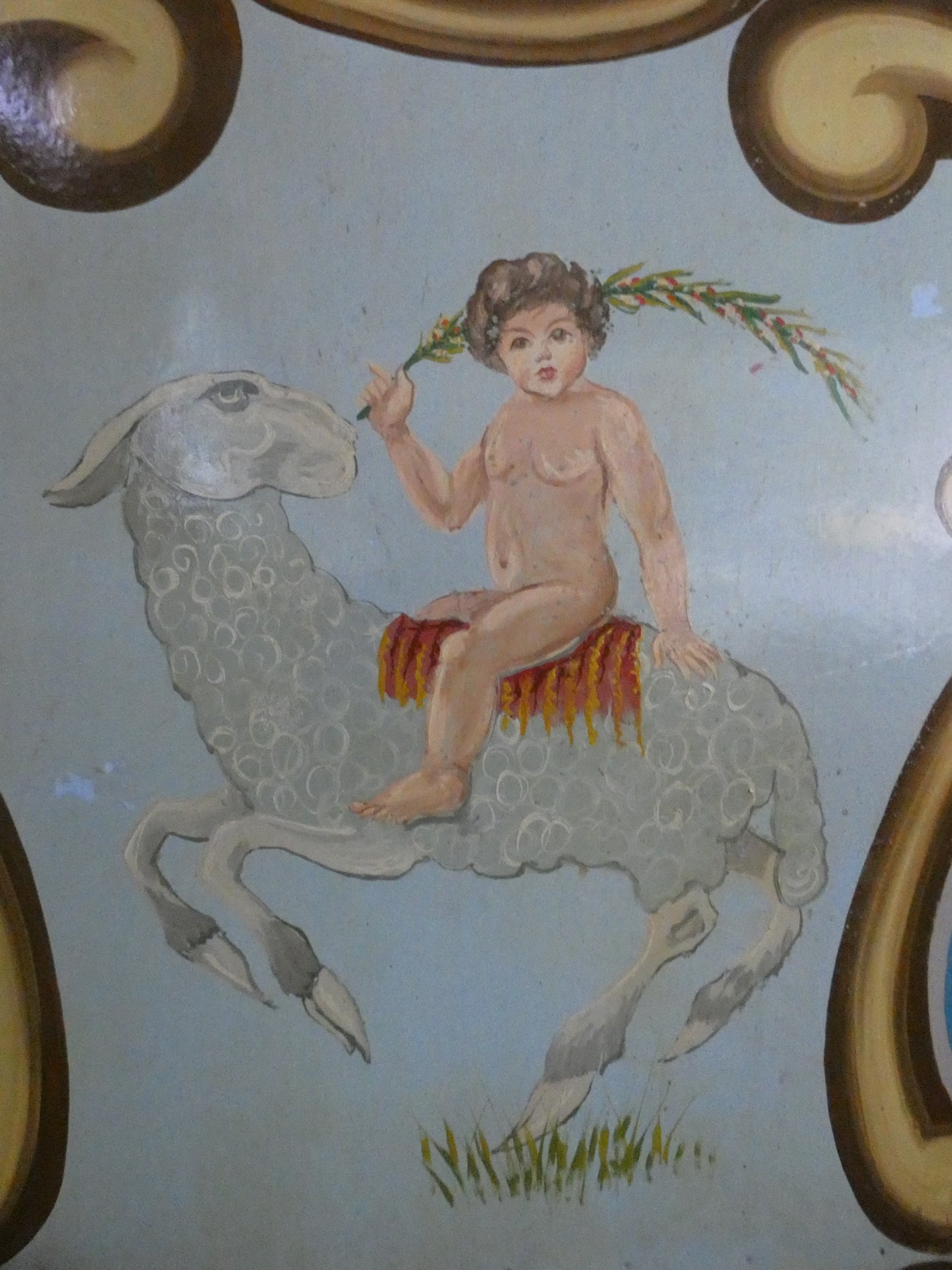 Antique Hand Painted wooden carousel fairground panel with cherub and sheep.