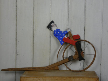 Vintage Folk Art Wooden Cycling Man / Toy – Handcrafted 1940s Kinetic Sculpture with Bell