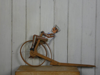 Vintage Folk Art Wooden Cycling Man / Toy – Handcrafted 1940s Kinetic Sculpture with Bell
